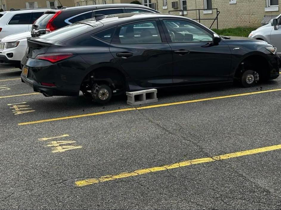 Wheels stolen in Bellerose side of the coop apartments.