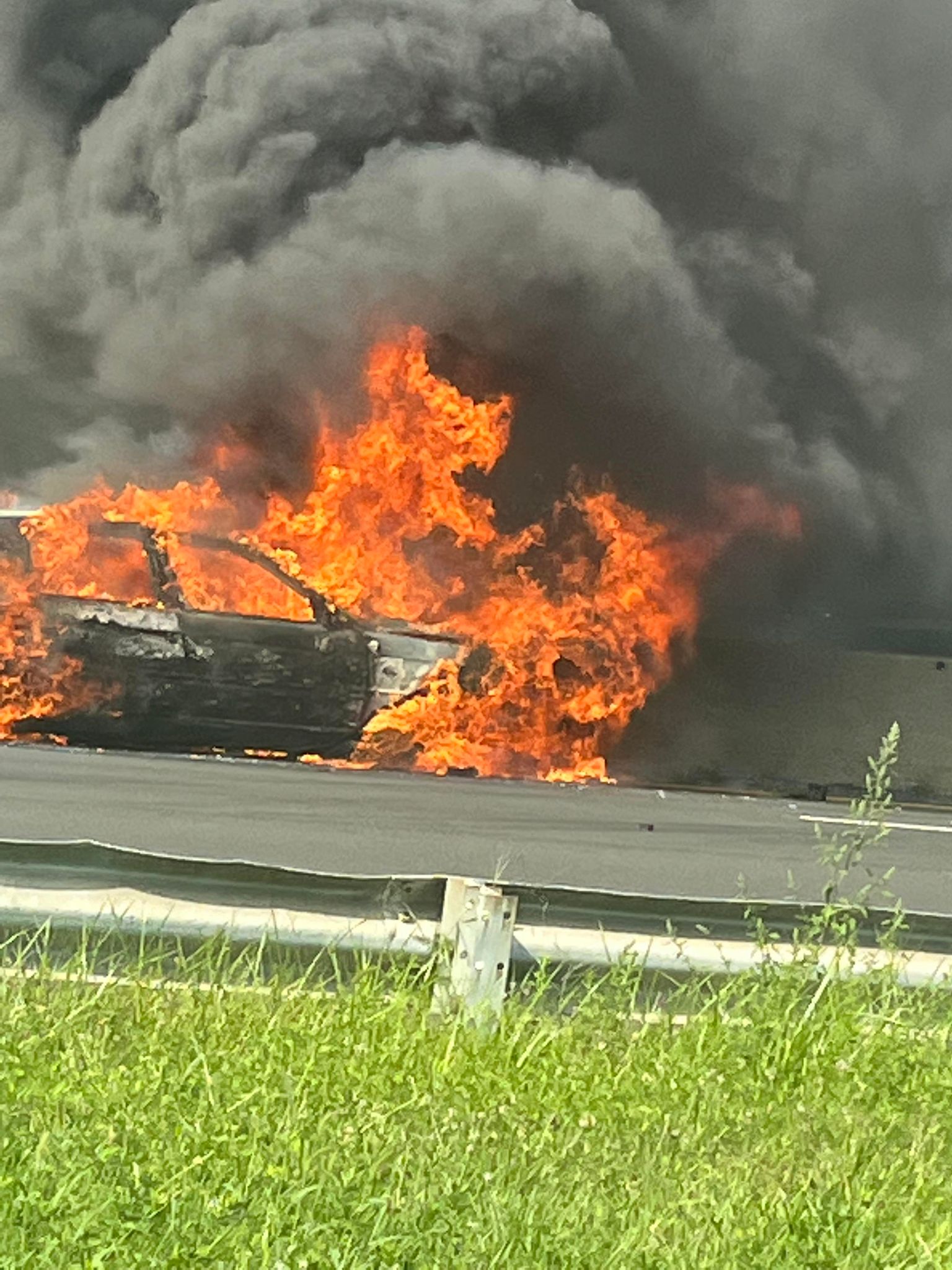Car fire on the Belt Parkway eastbound near the JFK airport.